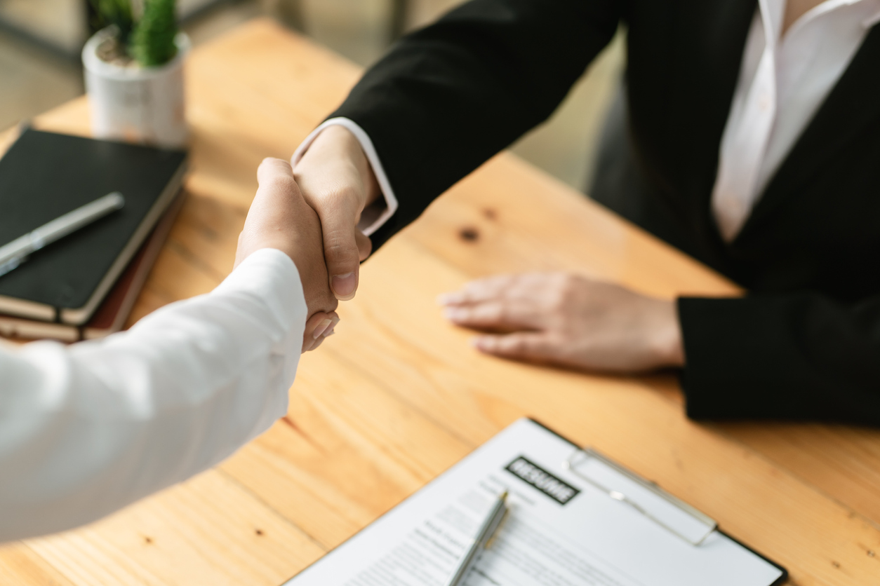 Two people shaking hands