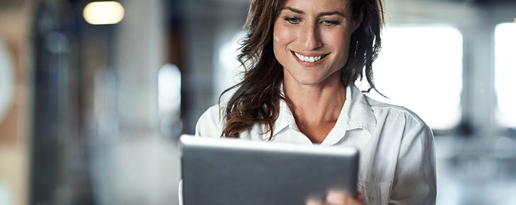 Woman working on her tablet