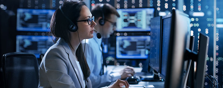 Woman working in public safety call center 