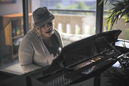 Trudi Lebron playing piano