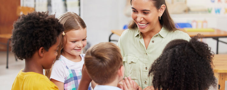 Woman teaching her class about musical instruments